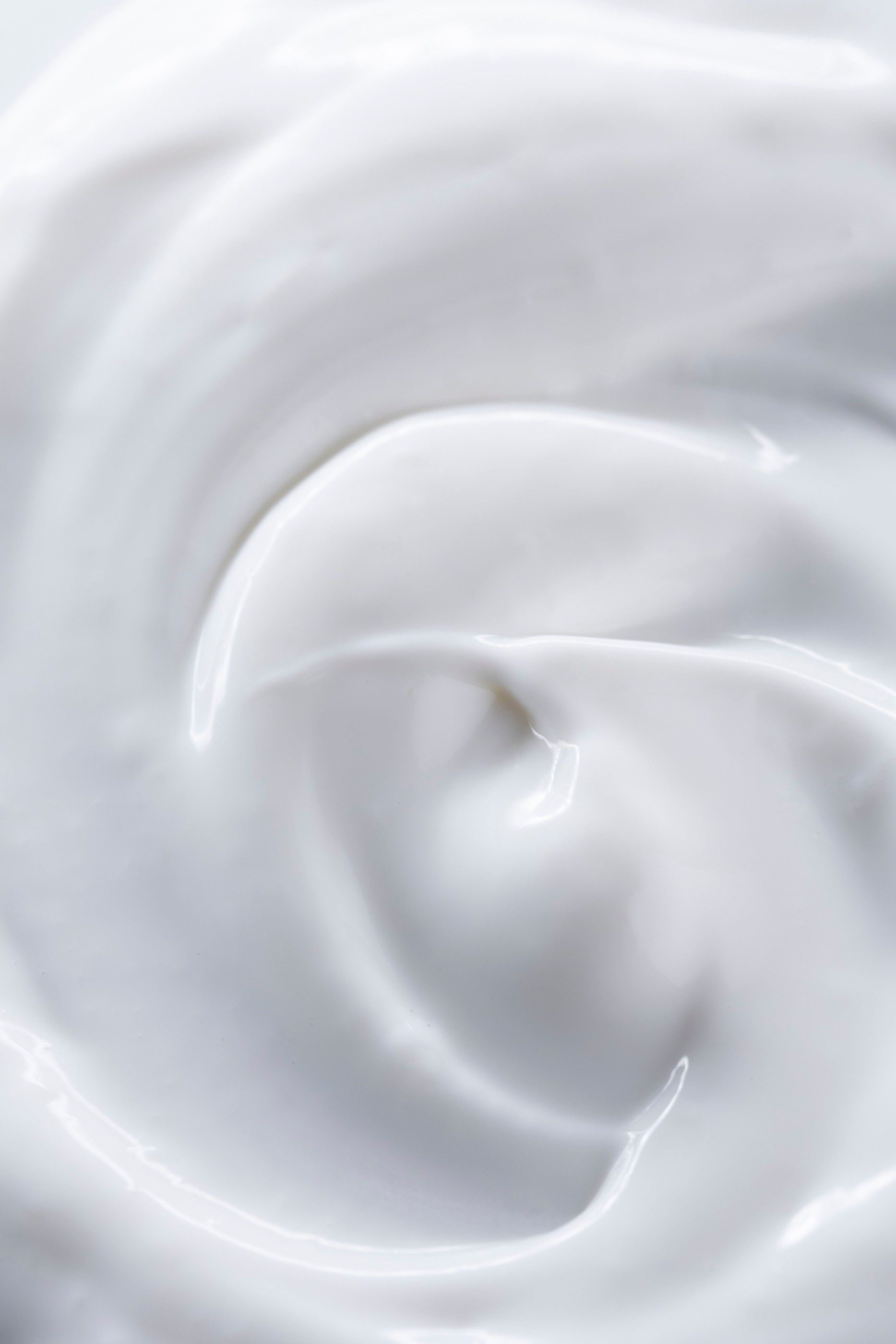 Texture of a white emulsion in a swirl
